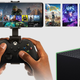 An android phone connected to an Xbox controller demonstrating Xbox's cloud streaming service.